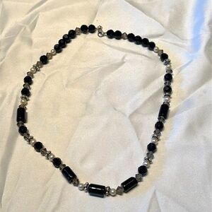 Black, white and silver bead necklace.